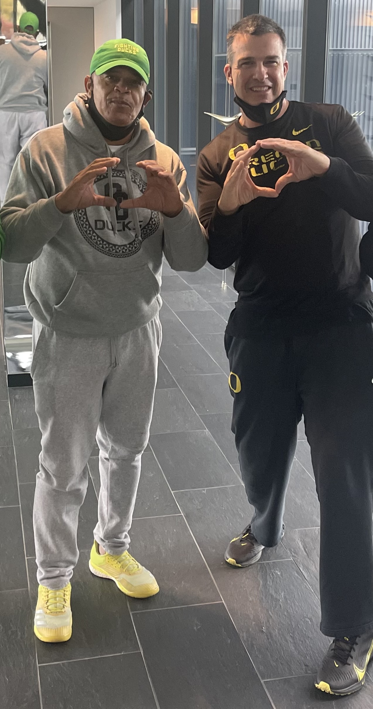 Nations Elite founder pictured with an Oregon football coach